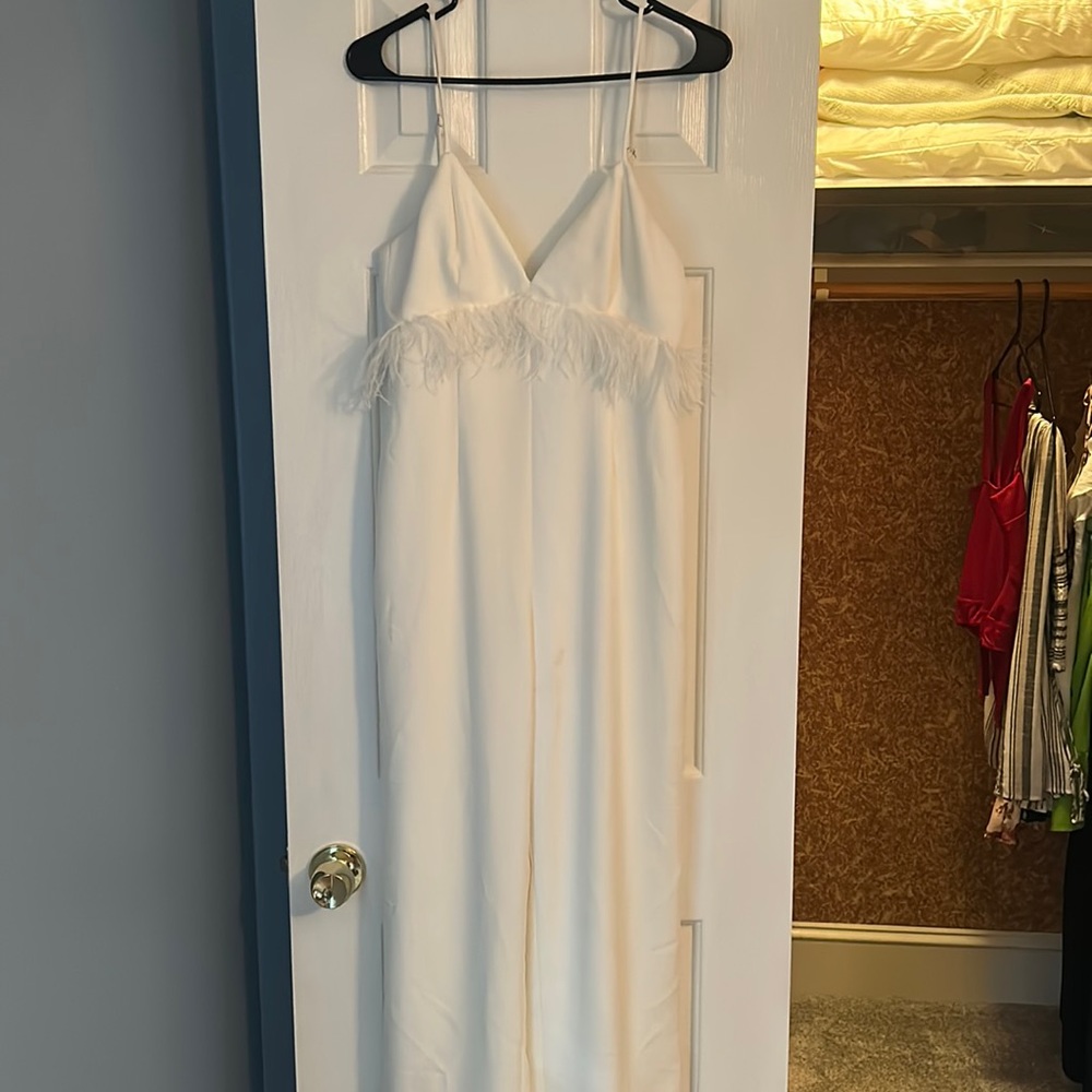 White saylor jumpsuit with feather detail